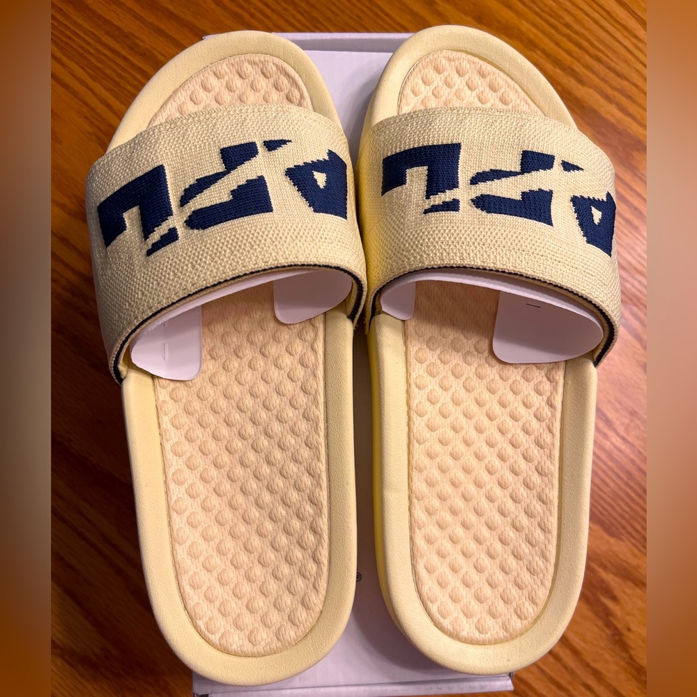 APL women’s tech loom slides. Buttery yellow and blue color. Size 8. NIB